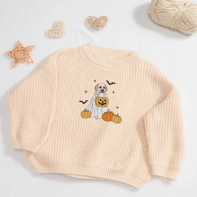 Beige sweater with Halloween-themed dog design on a light gray background