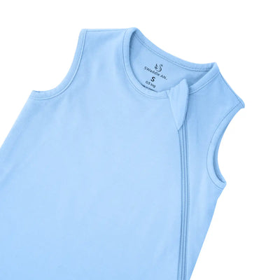 Blue bell sleeveless top on a white background