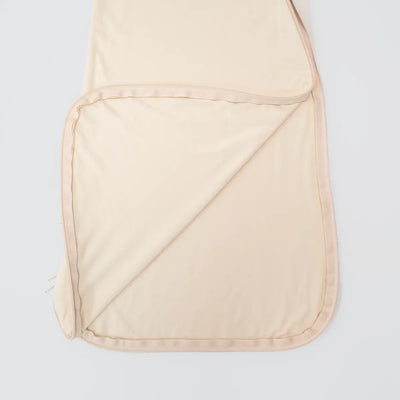 SwaddleAn™ 0.5 TOG Sleep Sack in our warm, earthy Sand hue is that dream made real.