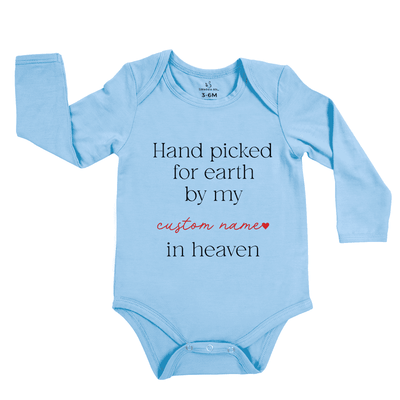 Light blue baby onesie with text on a white background