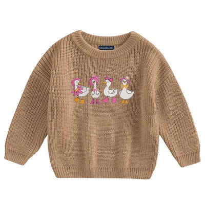 Brown knitted sweater with duck design on a white background