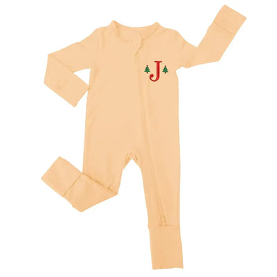 Beige baby onesie with a red letter 'J' and green trees on a white background