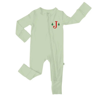 Light green baby onesie with a red letter 'J' and Christmas tree designs on a white background