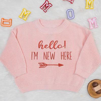 Embroidered Hello I_m New Here Baby Sweater in Pink
