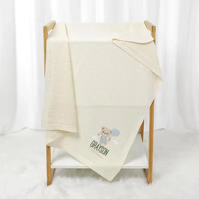 Personalized Teddy Bear Baby Blanket is more than a cozy layer; it’s a dreamy sky scene, where a sweet bear and your baby’s name float among the clouds, ready to drift off to sleep together.