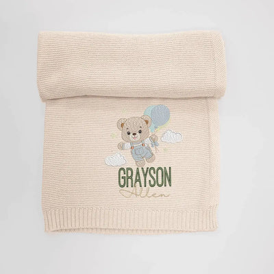 Personalized Teddy Bear Baby Blanket is more than a cozy layer; it’s a dreamy sky scene, where a sweet bear and your baby’s name float among the clouds, ready to drift off to sleep together.
