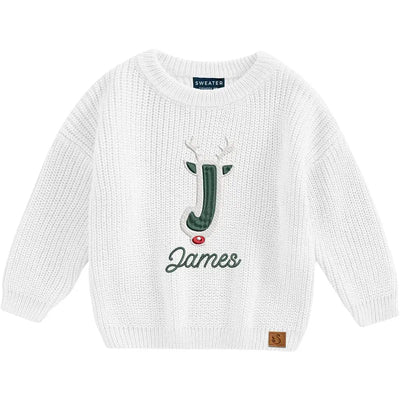 White sweater with a deer design and 'James' text on a white background