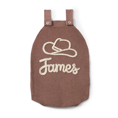 Brown knitted romper with 'James' and heart design on a white background