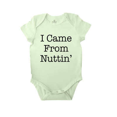 Light green baby onesie with 'I Came From Nuttin'' text on a white background