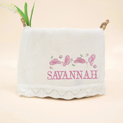 Personalized Western Pink Cowgirl Baby Blanket isn't just a cozy layer; it's a tender embrace of rustic elegance, lovingly stitched to celebrate the adventurous spirit of your new arrival.