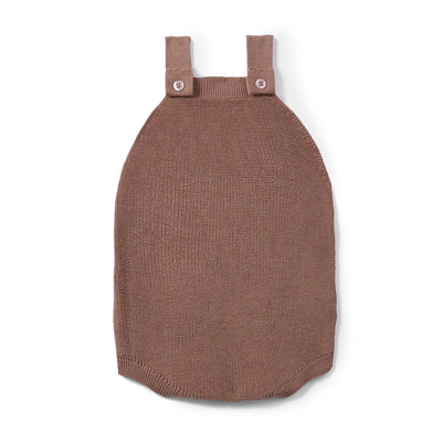 Brown knitted baby romper with straps on a white background