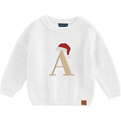White sweater with a letter 'A' and Santa hat on a white background