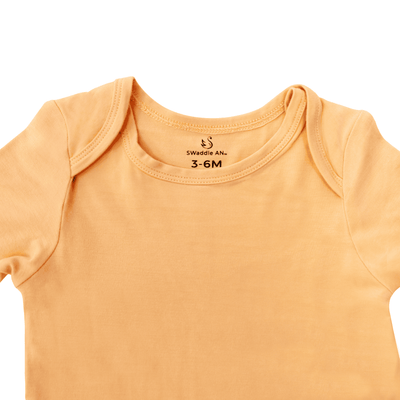 Long Sleeve Baby Bodysuit - Peach Fuzz SwaddleAn