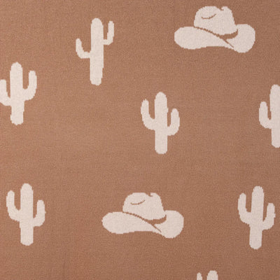 Pattern of cacti and cowboy hats on a brown background