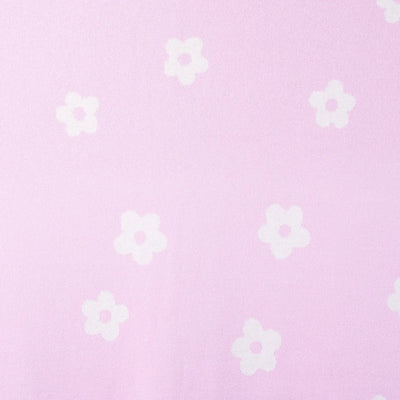 Pink background with small white floral patterns