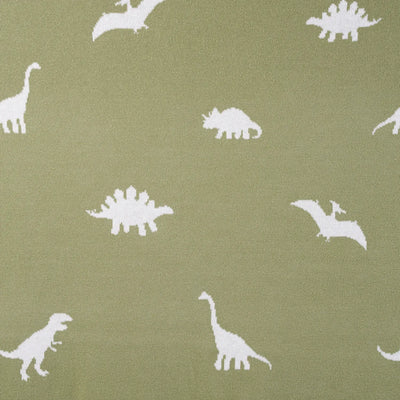 White dinosaur silhouettes on a green background