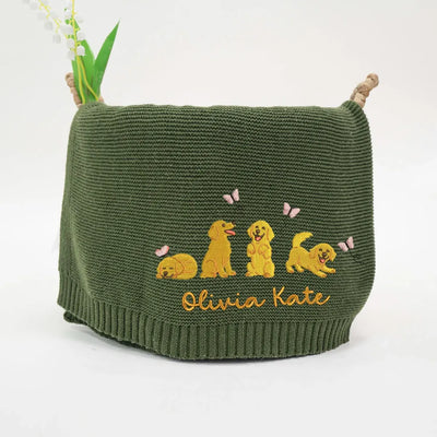 Forest green personalized baby blanket with embroidered golden retrievers and 'Olivia Kate' text on a white background