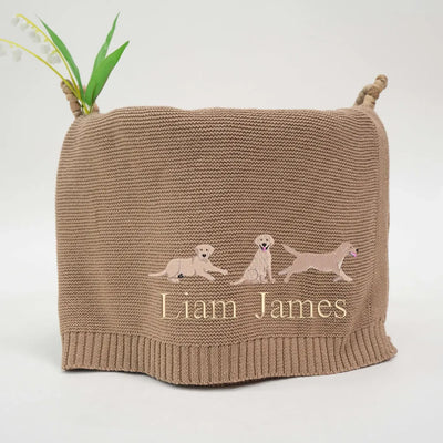 Mocha personalized baby blanket with embroidered labrador retrievers and text on a white background