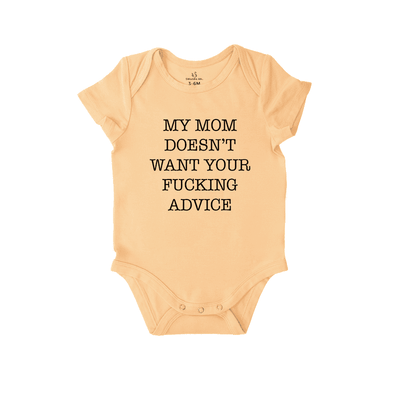 Beige baby onesie with black text on a white background