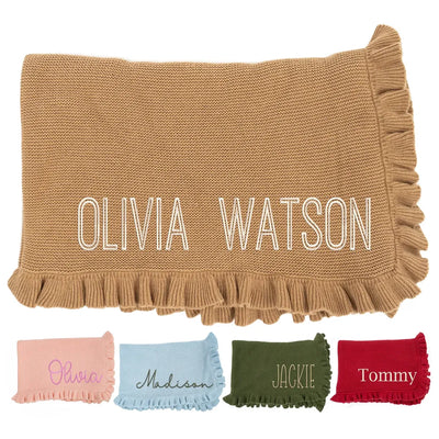 Personalized baby blanket with embroidered names and smaller samples of different colors on a white background