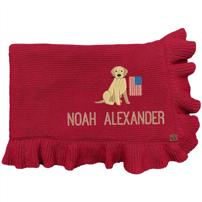 Red personalized baby blanket with a patriotic golden retriever and embroidered name on a white background