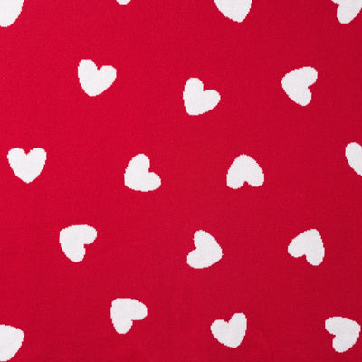 White hearts pattern on a red background