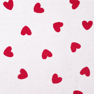 Pattern of red hearts on a white background